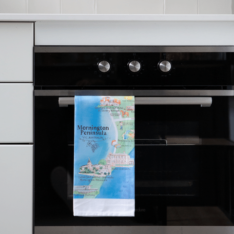 Original design of Mornington Peninsula wine region map tea towel on oven door